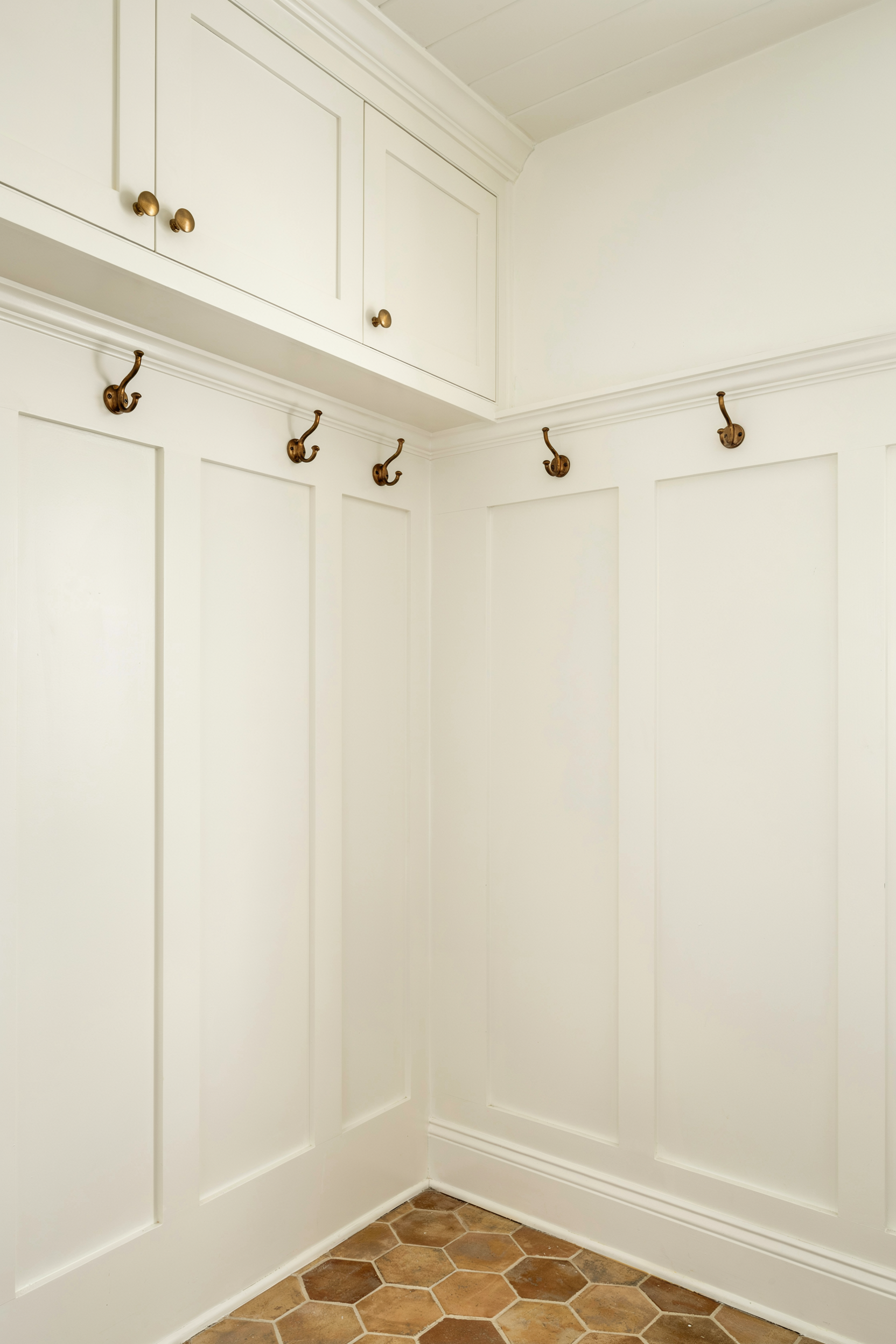 Mudroom Laundry Room With Wainscoting Detail