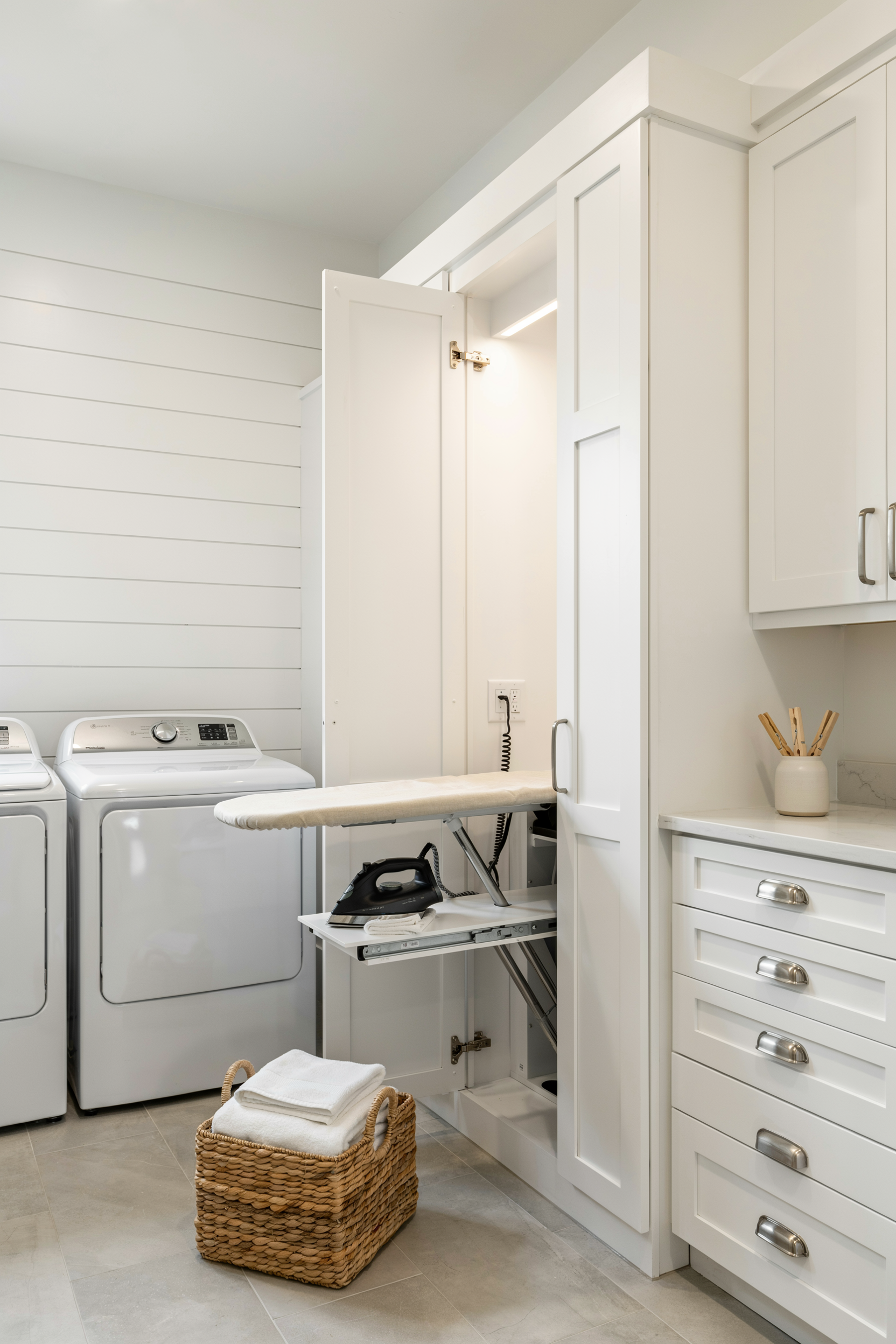 Pull-Out Ironing Board Hidden in Cabinet
