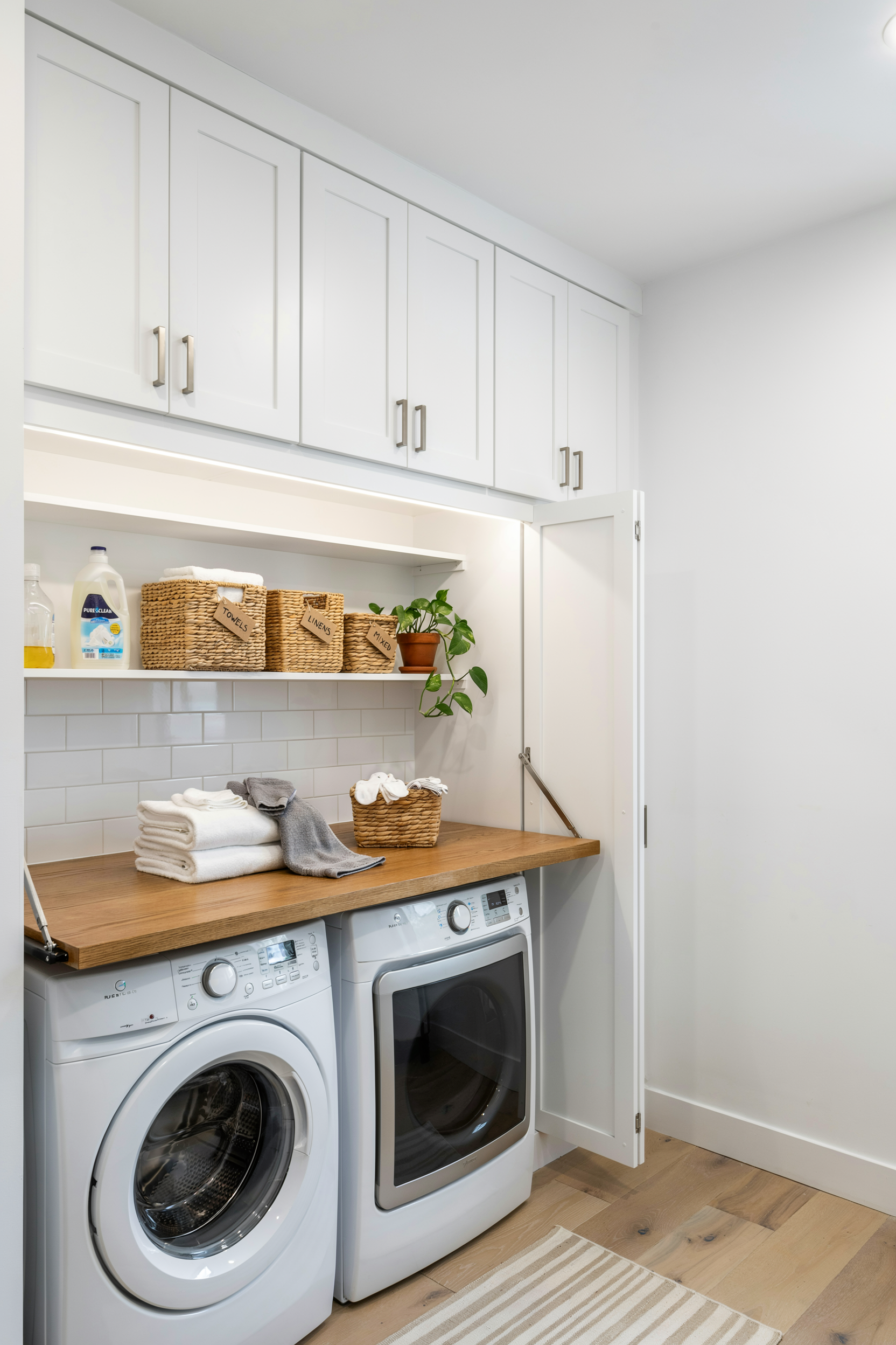 Basement Laundry Room With Folding Table That Hides