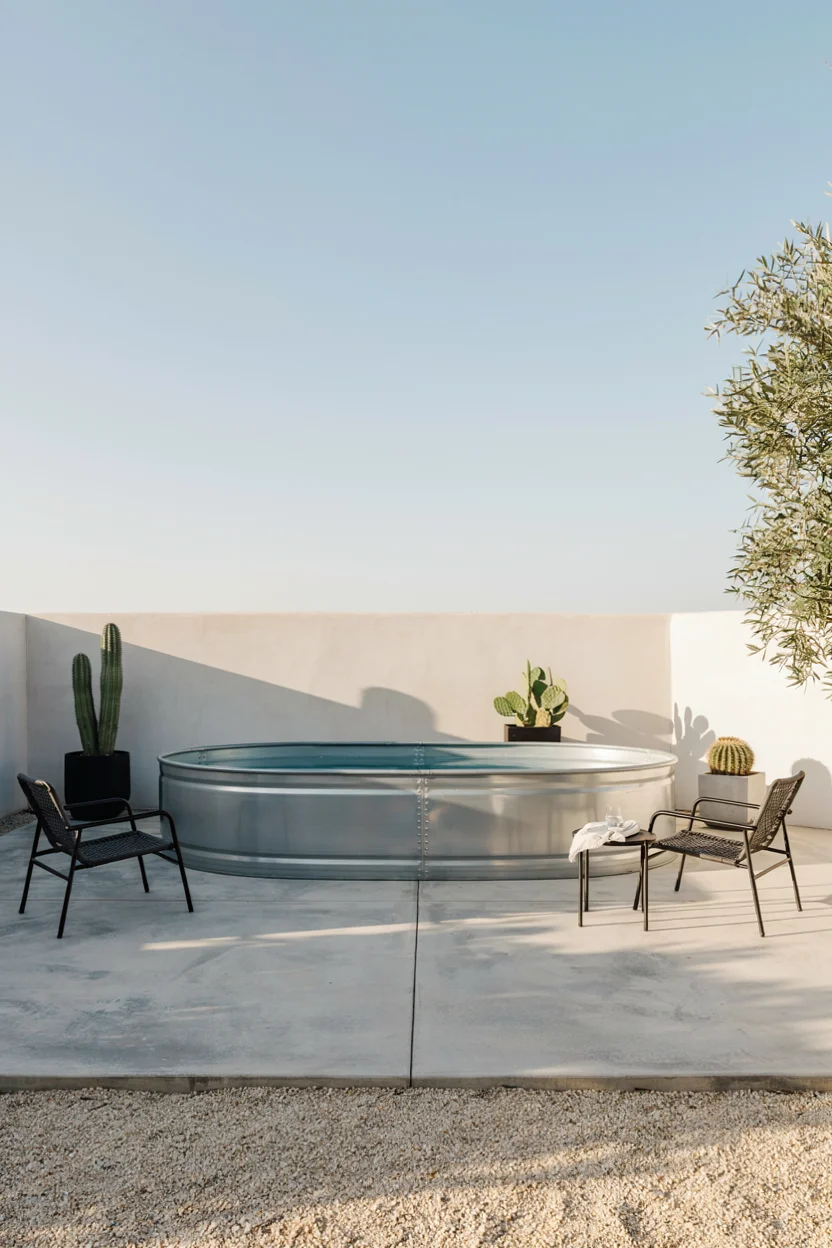Minimalist Stock Tank Pool on a Concrete Pad